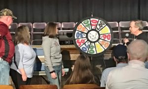 prize wheel game being played by attendees