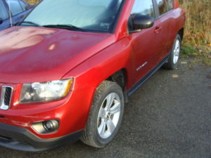 red jeep compass side view