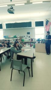 classroom of students participating in session