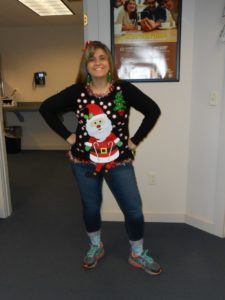 employee in ugly Christmas sweater