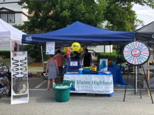 Credit Union tent set up at the festival with games and decorations