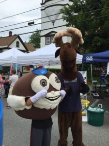 Monty Moose at festival with whoopie pie mascot 'sweetie pie'