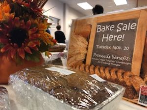 Bake Sale sign on table of goodies