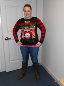 employee in ugly Christmas sweater