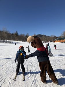 Monty Moose watching skiiers