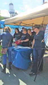 employees at festival booth