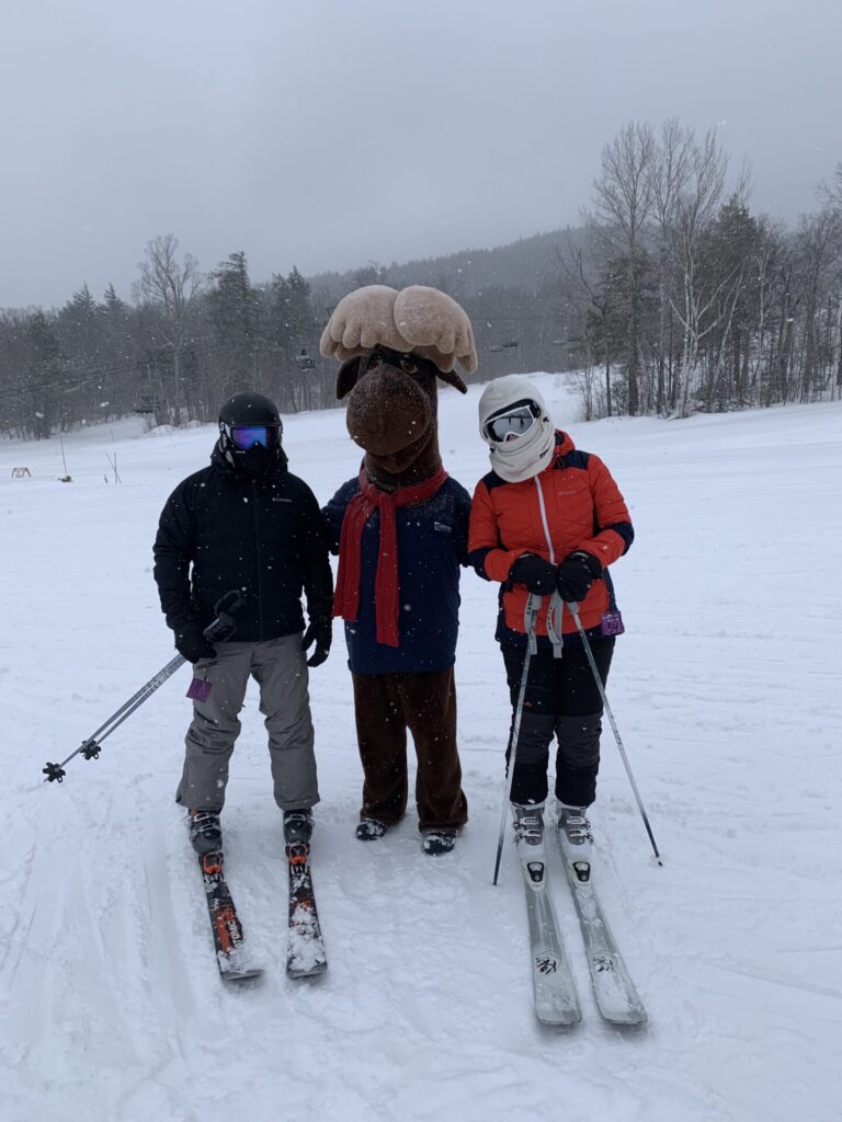 Monty Moose with Members Skiing